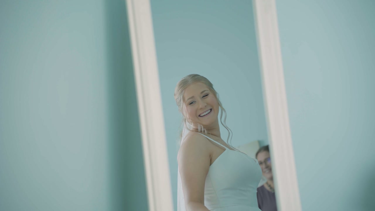 A cinematic still from Kaitlyn and Kyle's wedding film